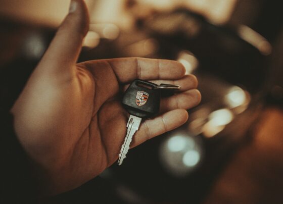 Hand holding a set of vehicle keys