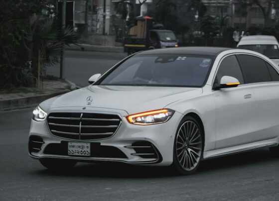 Silver Mercedes-Benz sedan parked on a street