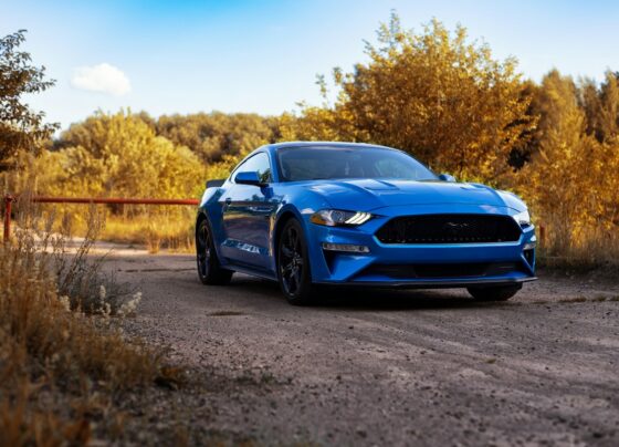 Blue Ford Mustang parked outdoors