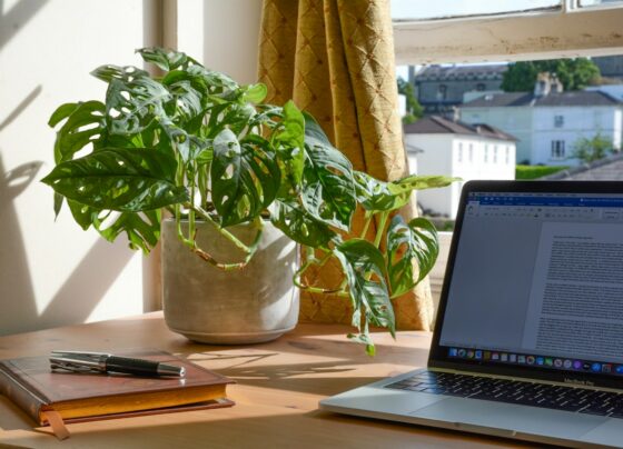 Home-office desk with computer and work materials