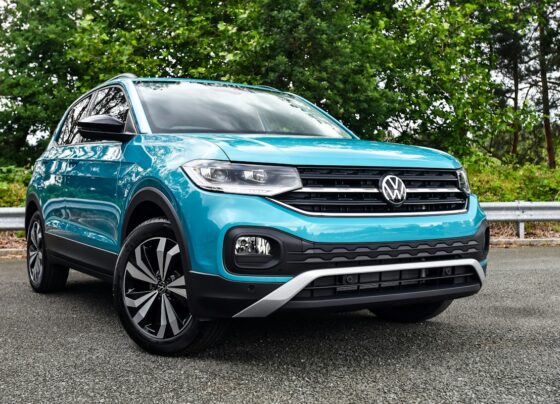 Turquoise Volkswagen SUV parked outdoors