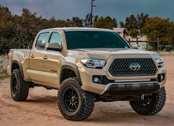 Lifted pickup truck with large off-road tires