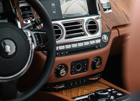 Car interior showing gear selector and center console